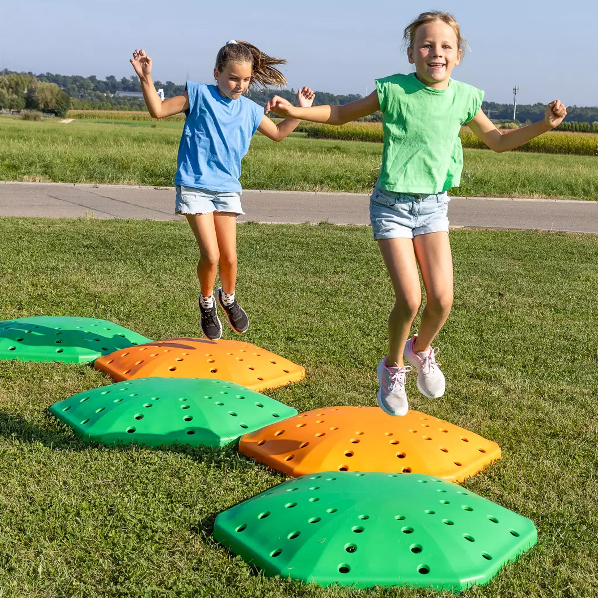 2 children jumping on BounceClouds